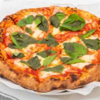 Margherita Pizza · Fresh tomatoes, fresh basil and fresh mozzarella cheese with olive oil and very light tomato...