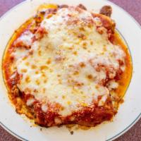 Lasagna · Layers of pasta with homemade marinara sauce, sauteed ground beef, mozzarella cheese and ric...