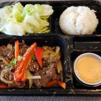 Bulgogi · Grilled thin sliced beef. Served with soup, rice, and salad.