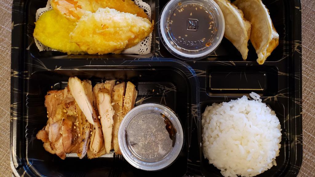 Child Box · Served with miso soup and rice beef or chicken teriyaki, 2 pcs gyoza, and 3 pcs vegetable tempura.