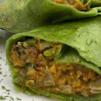 Breakfast Burrito · Just egg scrambled with sautéed bell pepper, onion, beyond sausages, vegan cheese, and grill...