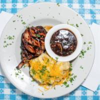 Grilled Pork Chop · marinated in house & served w/ smashed potatoes