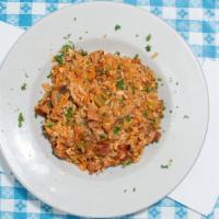 Jambalaya · chicken & andouille sausage simmered w/ rice & cajun seasonings