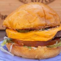 Just A Veggie · Veggie patty with American cheese, shredded lettuce, tomato, diced onion, and spicy buttermi...