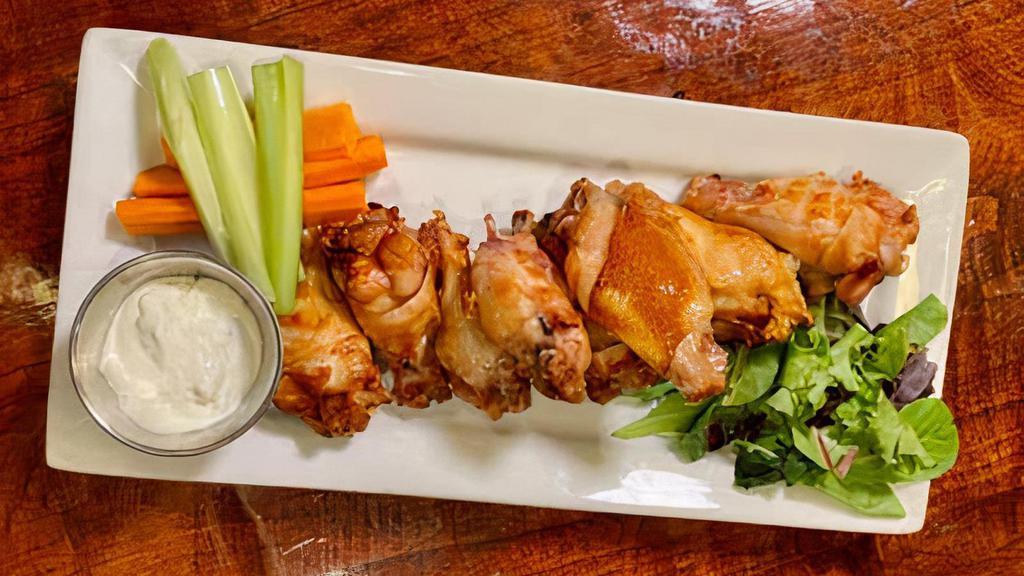 House Smoked Buffalo Wings · Eight jumbo wings served with bleu cheese and a choice of whiskey BBQ, sriracha BBQ, Sweet Chili, Hot or Mild sauce on side. If you want them tossed just ask.