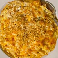Baked Mac & Cheese · Gemelli pasta tossed in a house-made three cheese sauce, topped with Parmesan, Jack & Chedda...