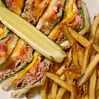 Ultimate Club · Fresh baked multi-grain, triple stacked with ham, turkey, applewood smoked bacon, lettuce, t...