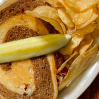 Turkeye Reuben Sandwich · Deli sliced turkey stacked high with Swiss cheese and thousand island dressing on grilled ma...