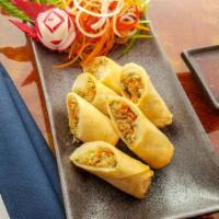 Spring Roll Veg · Julienne of vegetables in pastry wrap, deep fried served with sweet chili sauce