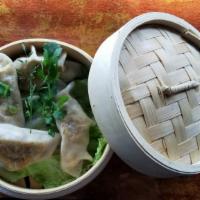 Vegetable Dumpling · Minced vegetables & cottage cheese in a wrap, steamed & sauteed