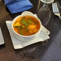 Tom Yum Veg · Thai hot 'n sour soup, fresh vegetables, and lemon grass