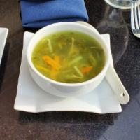 Lemon Coriander Veg Soup · Golden mushrooms, carrots, and bean sprout in a lemon flavored broth