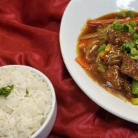 Mongolian Lamb  · Sliced lamb with bell pepper and onions served with chef’s special ginger sauce