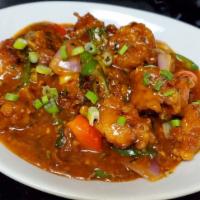 Hakka Chili Fish  · Tilapia fish in chili sauce with bell peppers onion and scallions