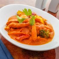 Veg Red Curry · Mixed vegetables and onions with bell-pepper, bamboo shoots in Coconut milk based curries