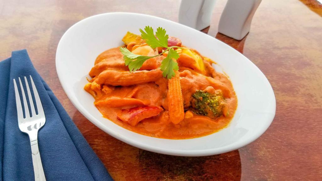 Veg Red Curry · Mixed vegetables and onions with bell-pepper, bamboo shoots in Coconut milk based curries