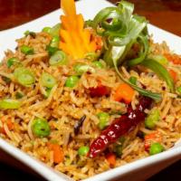 Sichuan Fried Rice · Basmati fried rice, green peas, onion, carrot, dry red chilies in sichuan sauce