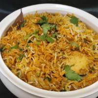 Chicken Biryani · Medium spicy. basmati flavored with exotic spices layered with chicken cooked in a thick gra...