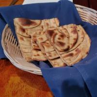 Parantha · Whole wheat bread in butter cooked in clay oven