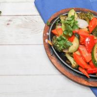Vegetarian Fajita · Fajita with zucchini, onions, green peppers, red peppers, broccoli, mushrooms, carrots and c...