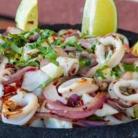 Ceviche Quibracatre · A Bigger take on our ceviche made with shrimp, tilapia, crabmeat, spicy calamari, cooked wit...