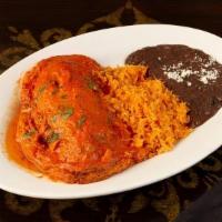 Chile Relleno · Poblano pepper stuffed with our delicious chicken, cheese and covered in tomato sauce. Serve...