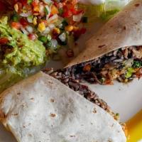 Burrito Clasico · 12” flour tortilla stuffed with rice, fried black beans, Monterrey Jack cheese, choice of Pr...