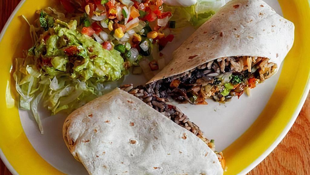Burrito Clasico · 12” flour tortilla stuffed with rice, fried black beans, Monterrey Jack cheese, choice of Protien. Served with salad, pico de gallo, guacamole and sour cream.