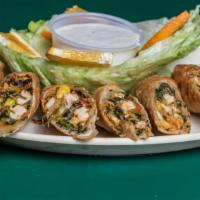 Southwest Eggrolls · Filled with black beans, corn, chicken and pico de gallo. Served with ranch dressing.