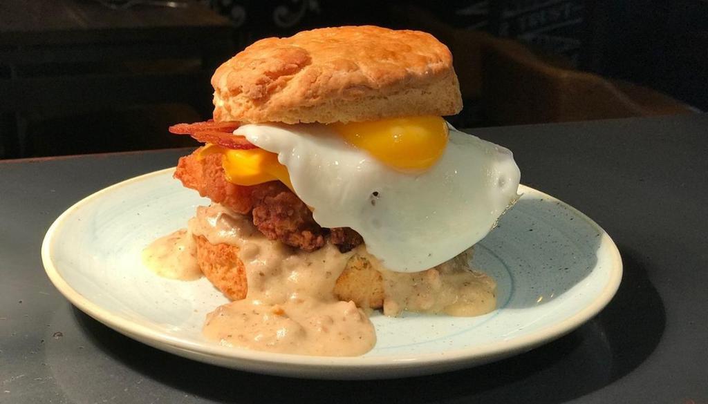 Biscuit & Gravy · country gravy, crispy chicken thigh, bacon,. sunny-side up farmer’s egg