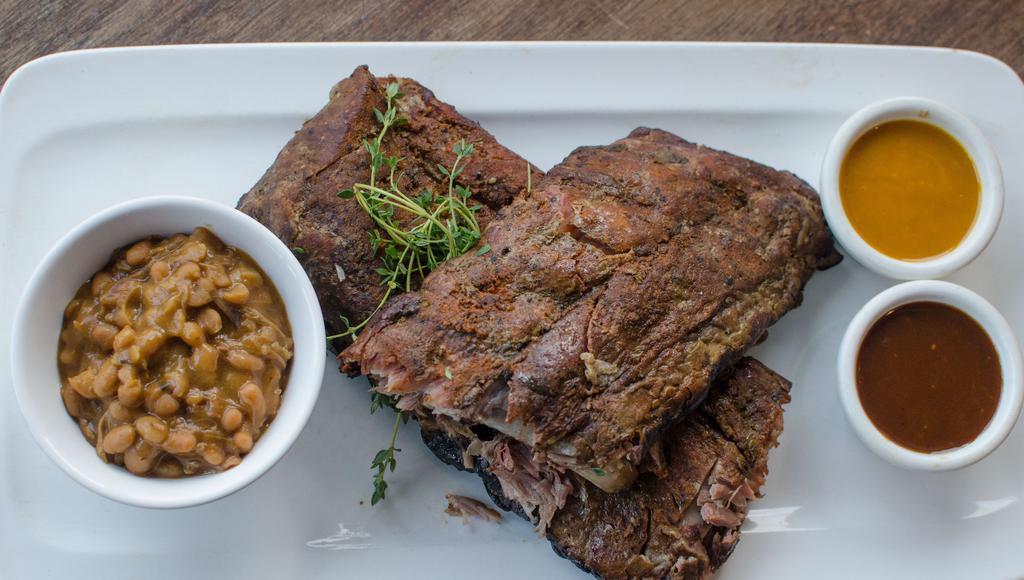 Full Slab St Louis Ribs · Choice of 2 sides, cornbread or Texas toast, garden pickles, and sauce.