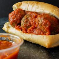 Meatball Sandwich · Three meatballs on French bread and topped with marinara sauce.