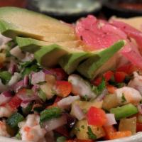 Tropical Ceviche · Macerated fish and shrimp in lime juice with charred pineapple, red bell pepper, jalapeños, ...