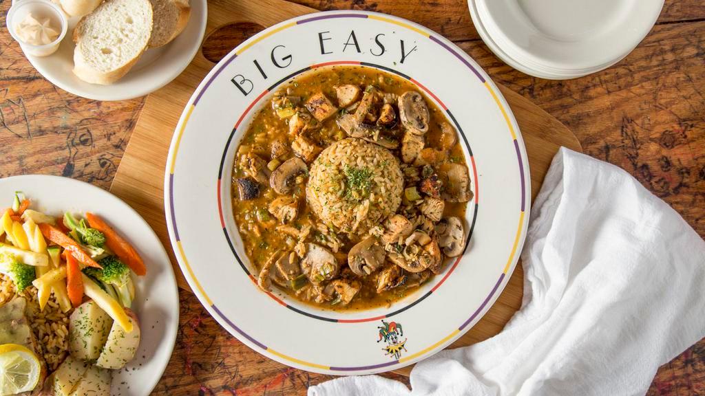 Blackened Chicken ＆ Mushroom Etouffée · Spicy. Diced blackened chicken tenders sauteed with mushrooms in  our spicy dark roux and stock sauce.