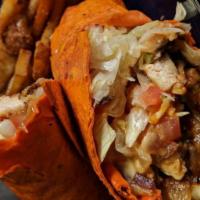 Buffalo Chicken Wrap · Our famous chicken tenders tossed in buffalo sauce, bleu cheese, lettuce and tomato folded i...