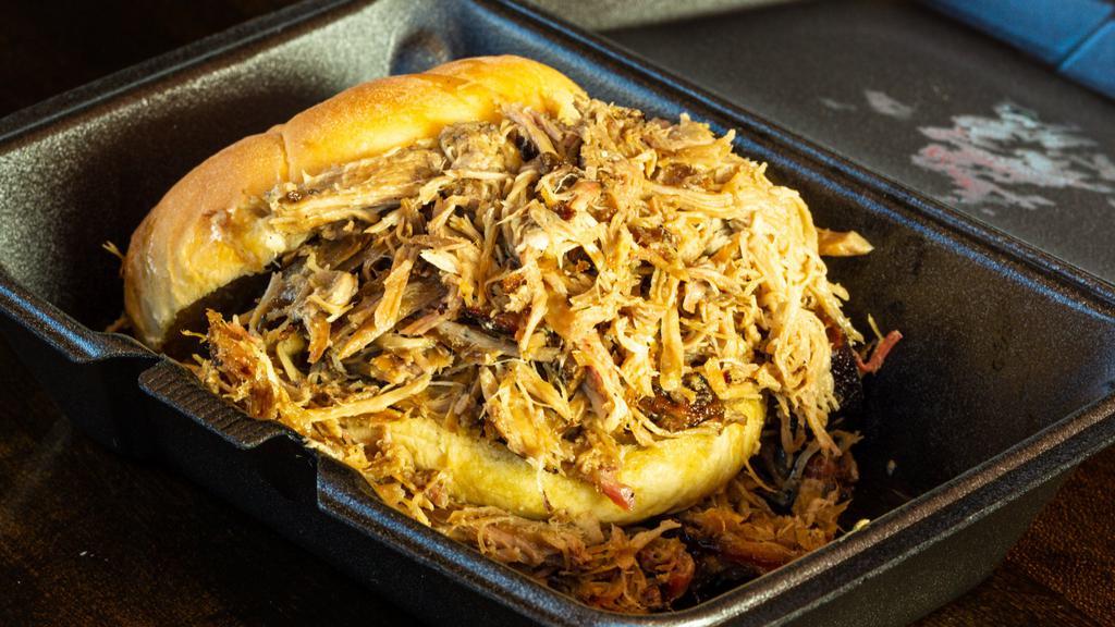 Pulled Pork Sandwich · Includes one half pint side