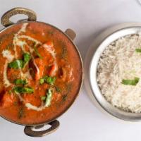 Butter Chicken · Boneless white meat chicken cooked with exquisite creamy tomatoes sauce.