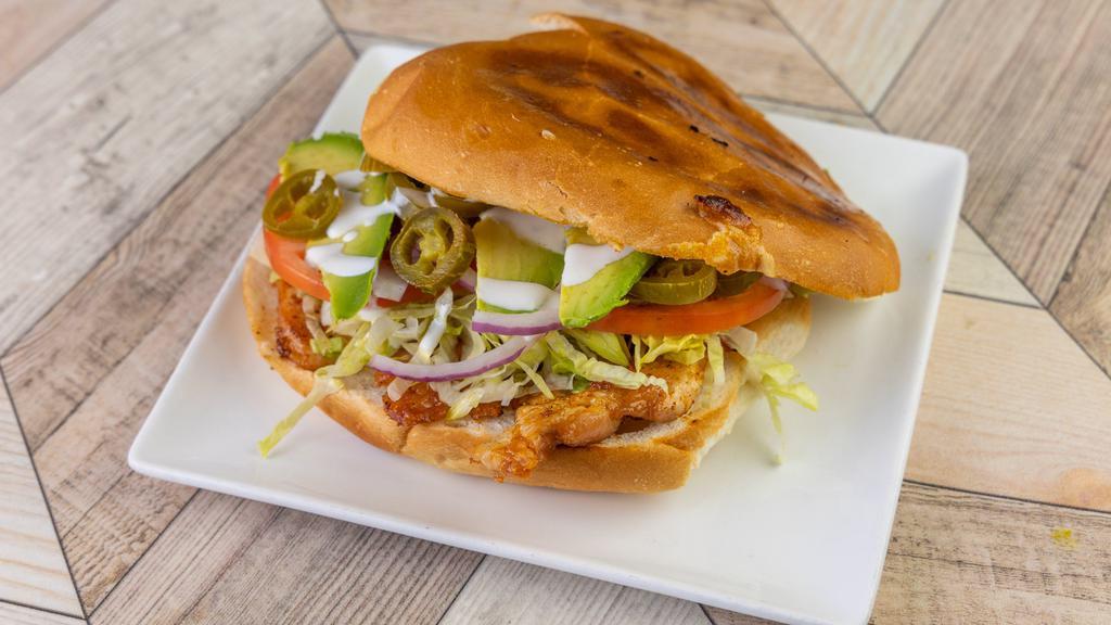 Tortas (Una Carne) / Tortas (One Protein) · Con lechuga, tomate, queso, aguacate, frijol, jalapeño. / With lettuce, tomato, cheese, avocado, beans, jalapeño.