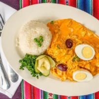 Aji De Gallina · Chicken Stew cooked with yellow chili peppers,  garlic, spices, crackers, chicken broth, cho...