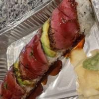 Tuna Amazing Roll · Spicy tuna, top with pepper tuna, avocado, and scallion, eel sauce.