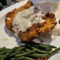 Chicken Fried Chicken · Huge all-natural chicken breast hand breaded and fried golden perfection and smothered in ou...