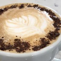 Real Chocolate Latte (Hot Only) · Chocolaty latte w/ real chunks of dark chocolate.