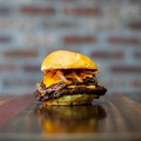 #11 Philly Burger · Angus Burger topped with Philly Cheesesteak, Sautéed Onion, American Cheese, Ketchup and May...