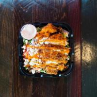 Buffalo Chicken Salad · Grilled or fried Buffalo Chicken, Mixed Greens, Red Onions, Diced Tomatoes, Bleu Cheese, tos...