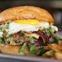 The Remedy Burger · Burger topped with bacon, cheddar cheese, sliced jalapeno peppers, and a fried egg. Served o...