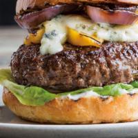 The Kickstart Burger · Burger topped with gorgonzola and grilled pineapple. Served on a brioche bun with caramelize...