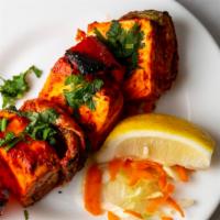 Tandoori Paneer Tikka · Homemade cheese marinated in mild spices and cooked in tandoor.