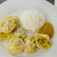 Momo (Dumpling) · Minced of chicken /vegetable marinated with fresh ginger, garlic, and nepali spices wrapped ...