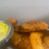 Homemade Chicken Tenders · Made to order. With honey mustard.