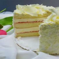 White Bavarian Raspberry · Three layers of white cake filled with Bavarian cream with thin layers of raspberry jam, and...